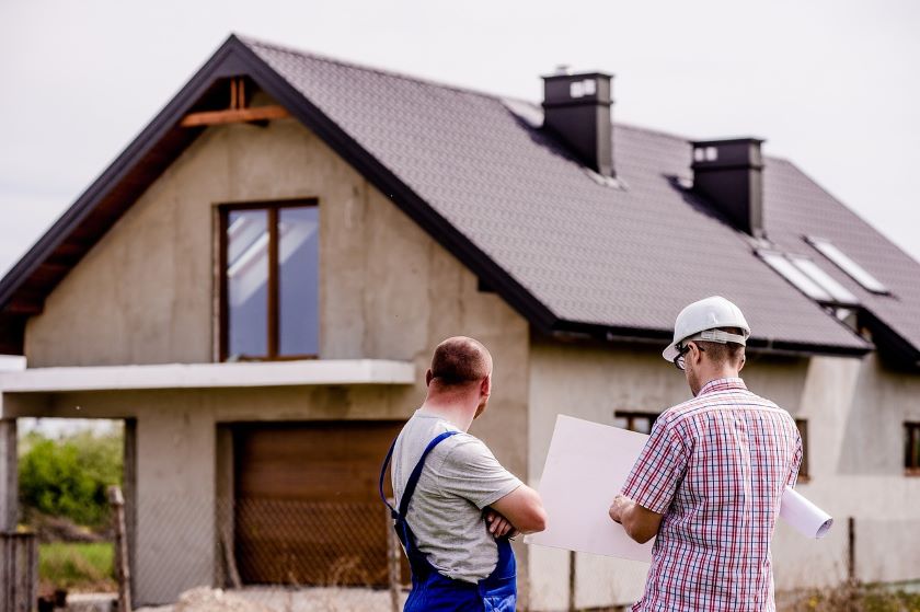 Surveyors Professional Indemnity Insurance - Surveyors-building-with-plans
